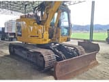 Komatsu PC138US-8 crawler excavator, front three-quarter view