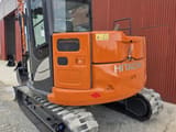 2020 Hitachi ZX85USB-6 mini excavator rear three-quarter view