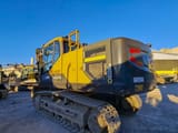 2015 Volvo EC220ENH crawler excavator, rear three-quarter view