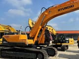 2022 Hyundai 305LC-9T crawler excavator, side view
