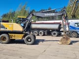 1999 Volvo EW160 wheel excavator, side profile view