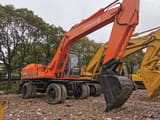 2015 Hitachi EX160WD wheel excavator, side view