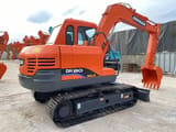 2023 Doosan DH80 mini excavator, rear three-quarter view