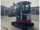 2019 Takeuchi TB23R mini excavator, rear three-quarter view