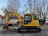 2006 Komatsu PC110 crawler excavator, side profile view