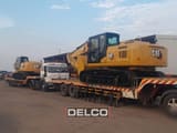 2026 Caterpillar 324 crawler excavator, rear three-quarter view