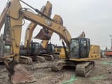2021 Caterpillar 320GC crawler excavator, front three-quarter view