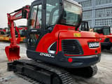 2023 Doosan DX60-9C mini excavator, rear three-quarter view