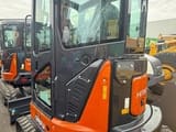 2025 Hitachi ZX38U-6 mini excavator, rear three-quarter view