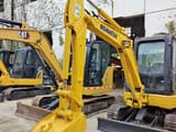 2023 Komatsu PC35MR-2 mini excavator, front three-quarter view