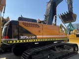 2023 Hyundai 305LC-9T crawler excavator, rear three-quarter view