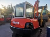 2002 Kubota KX71-2 mini excavator, rear three-quarter view