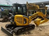 Komatsu PC-55MR mini excavator, front three-quarter view