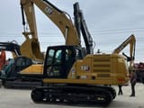2023 Caterpillar 320GC crawler excavator side view