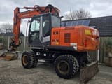 2008 Hitachi Zaxis 170W wheel excavator, rear three-quarter view