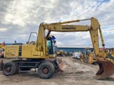 1998 Komatsu PW170ES wheel excavator side view