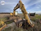 1995 Komatsu PC120-5 crawler excavator, front three-quarter view