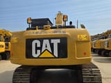 2023 Caterpillar 323D2L crawler excavator, rear view