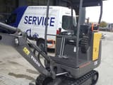 2015 Volvo EC15C mini excavator, side view