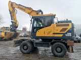 2016 Hyundai HW140 wheel excavator, side profile view