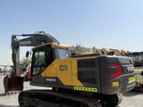 2025 Volvo EC210 crawler excavator, rear three-quarter view