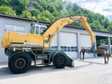 2004 Liebherr 944 material handler side view