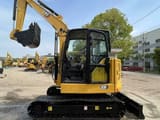2024 Caterpillar 306 mini excavator, side profile view