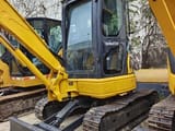 2023 Komatsu PC35MR-2 mini excavator, front three-quarter view