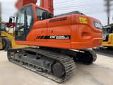 2024 Doosan DX225LC crawler excavator rear three-quarter view