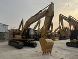2024 Caterpillar 320GC crawler excavator, front three-quarter view