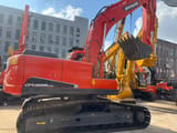 2023 Doosan DX225LCA crawler excavator, rear three-quarter view