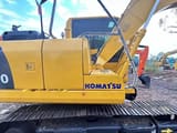 Komatsu PC110 crawler excavator side view