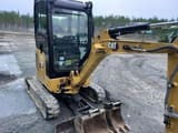 2023 Caterpillar 302 mini excavator, front three-quarter view