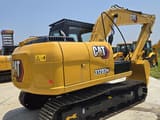 2022 Caterpillar 312D2 excavator, rear three-quarter view