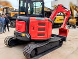 Hitachi ZX55USR-5A mini excavator, rear three-quarter view