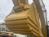 2015 Caterpillar 320D crawler excavator bucket close-up