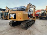 2023 Caterpillar 315D crawler excavator, rear three-quarter view