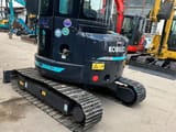 2023 Kobelco SK55SR mini excavator, rear three-quarter view