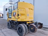 2019 Caterpillar M323F wheel excavator, rear three-quarter view