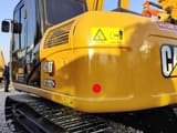 2023 Caterpillar 312D GC crawler excavator, rear three-quarter view