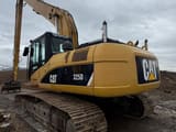 2007 Caterpillar 325DL crawler excavator, rear three-quarter view