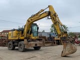 2007 Komatsu PW140-7 wheel excavator, side view