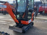 2024 Kubota KX019-4 mini excavator, front three-quarter view