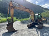 1998 Komatsu PC200-3 crawler excavator, side view