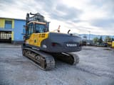 2009 Volvo EC210CNL crawler excavator, rear three-quarter view