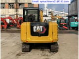 2023 Caterpillar 305.5E2 mini excavator, rear view