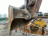 2020 Doosan 520 excavator bucket and hydraulic attachment close-up