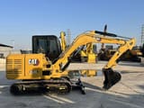 2024 Caterpillar 305.5E2 mini excavator, side view
