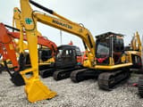 2023 Komatsu PC130 excavator, front three-quarter view