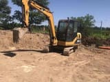 2020 Caterpillar 305.5 mini excavator, side view